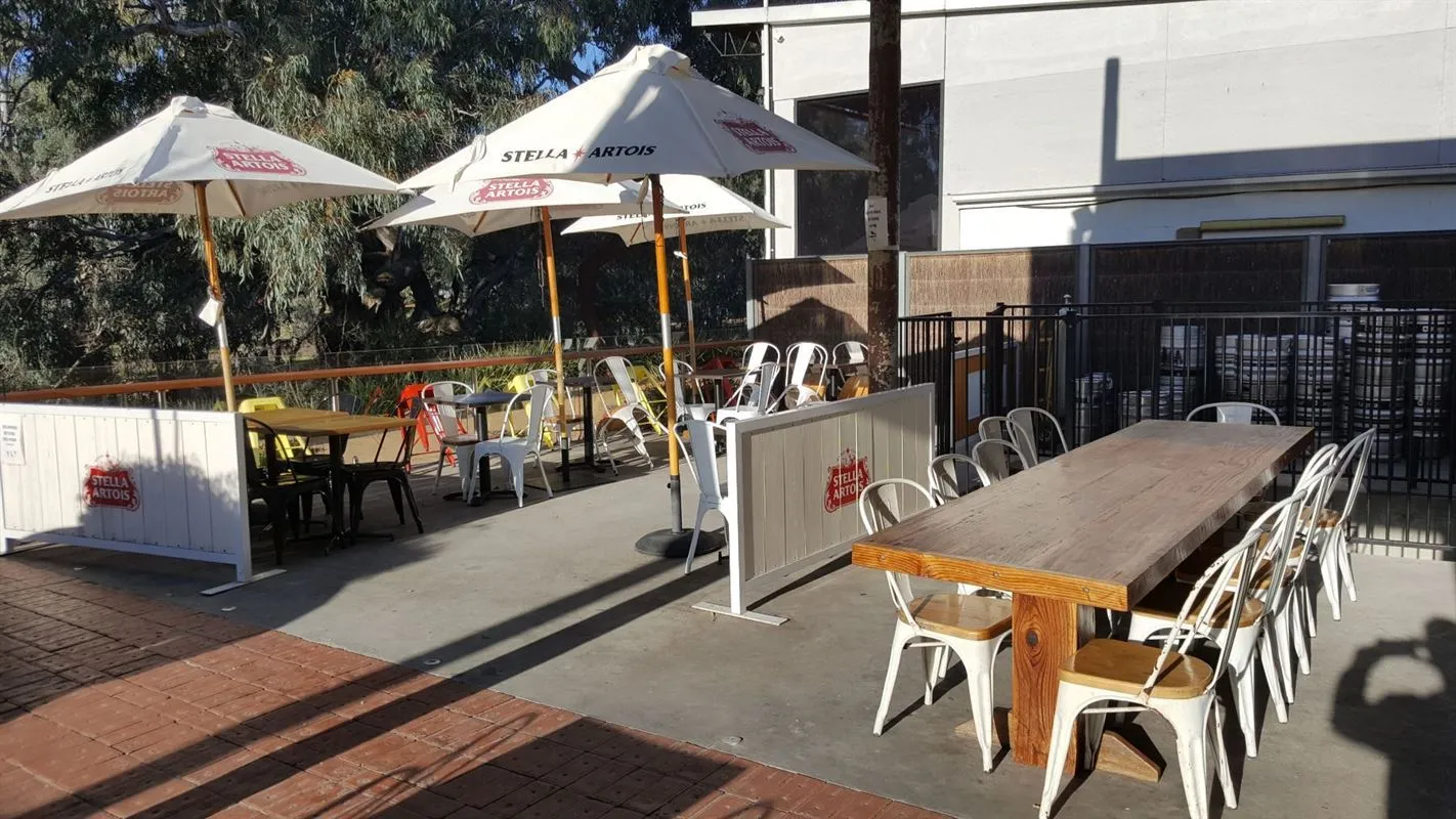 Umbrellas and tables on the outdoor deck
